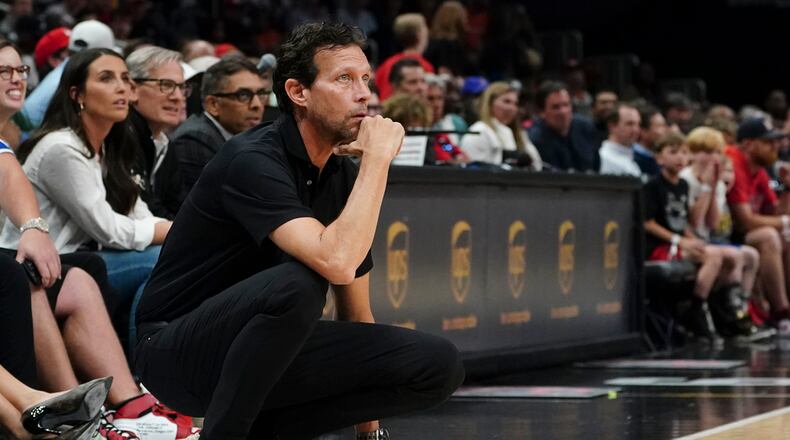 Hawks coach Quin Snyder watches from the sideline against the Washington Wizards, Wednesday, April 5, 2023, in Atlanta. (AP Photo/John Bazemore)