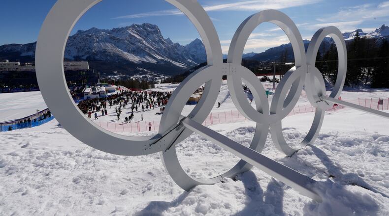 FILE - Olympic rings are seen at the 2026 Winter Olympics in Cortina d'Ampezzo, Italy, Feb. 8, 2026. (AP Photo/Robert F. Bukaty, File)
