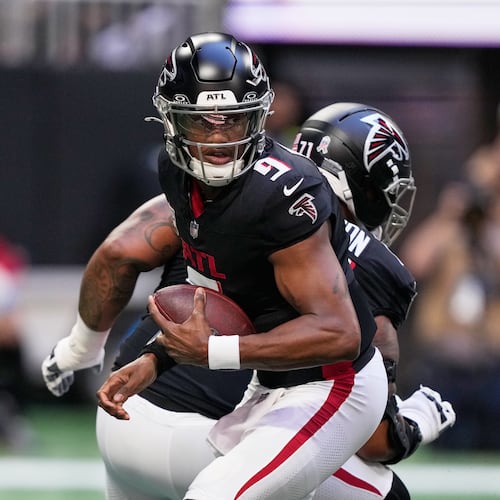 Atlanta Falcons quarterback Michael Penix Jr. (9) drops back against the Carolina Panthers in the first half of an NFL football game, Sunday, Nov. 16, 2025, in Atlanta. (AP Photo/Brynn Anderson)