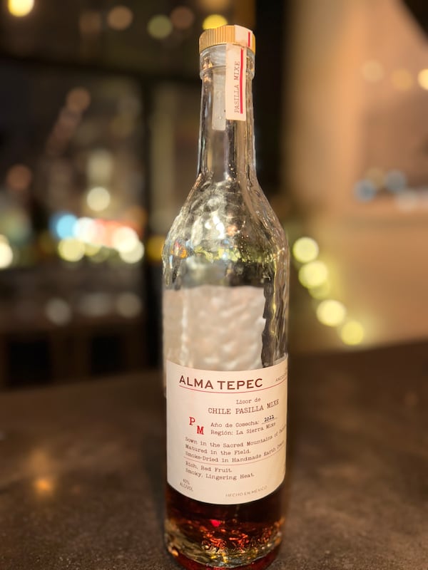 Made from the pasilla Mixe pepper grown only in the Sierra Mixe mountains of Oaxaca, Alma Tepec liqueur has a soft, lingering heat. (Angela Hansberger for The Atlanta Journal-Constitution)