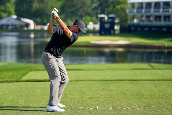 Adam Scott, of Australia, hits his tee shot on the 17th hole during the first round of the PGA Championship golf tournament at the Quail Hollow Club, Thursday, May 15, 2025, in Charlotte, N.C. (AP Photo/David J. Phillip)
