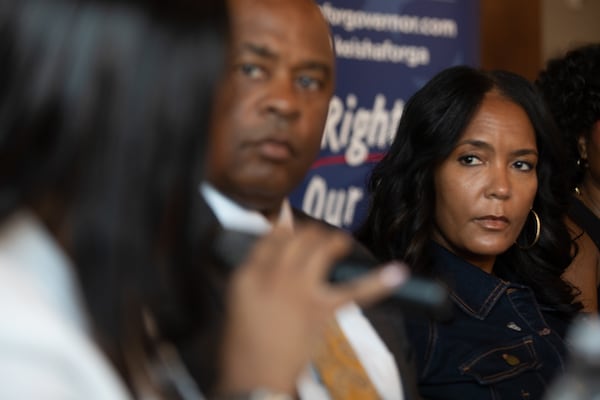 Democratic candidate for governor Keisha Lance Bottoms listens to healthcare providers during a roundtable discussion at Blend n' Brew coffee shop in Statesboro last month. (Riley Bunch/AJC)