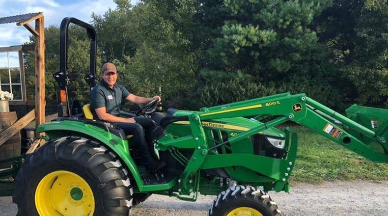 Gwinnett Commissioners recently agreed to the purchase of 4 replacement tractors with loaders and 1 new mower. (Courtesy John Deere)