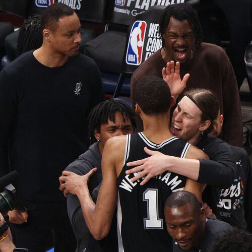 San Antonio Spurs forward Victor Wembanyama (1) celebrates with teammates after winning Game 1 in a third-round NBA basketball playoffs series against the Oklahoma City Thunder Monday, May 18, 2026, in Oklahoma City. (AP Photo/Nate Billings)