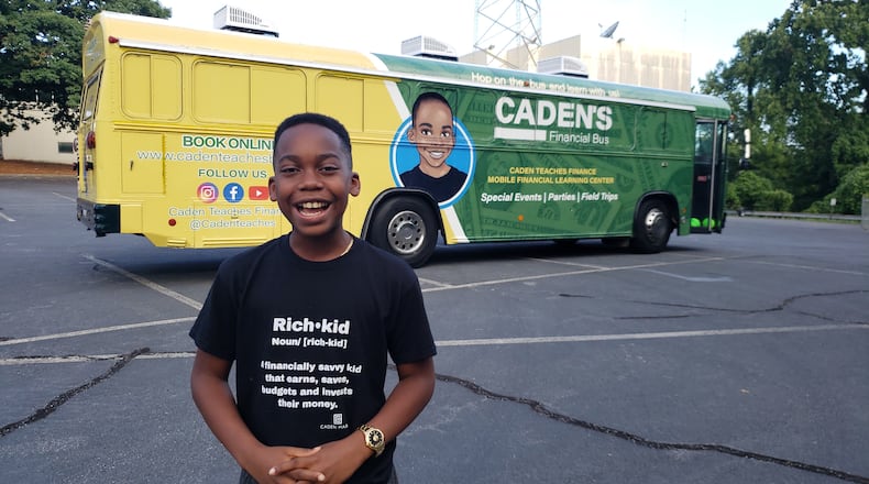 Caden Harris, 11, is taking his financial literacy program on the road in a retrofitted bus with a mock grocery, bank and ATM.