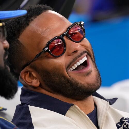 FILE - Former Los Angeles Rams player Aaron Donald looks on before an NFL football game between the Los Angeles Rams and the Tampa Bay Buccaneers, Nov. 23, 2025, in Inglewood, Calif. (AP Photo/Mark J. Terrill, File)