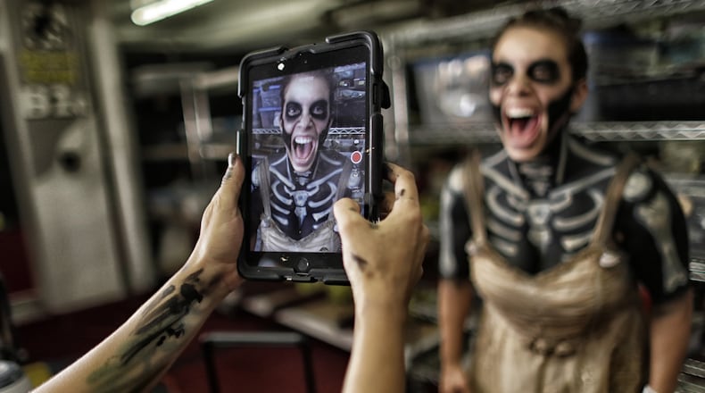 Elissa Danshaw is photographed by her makeup artist Carole Soueidnn backstage at Halloween Horror Nights at Universal Studios. (Robert Gauthier/Los Angeles Times/TNS)