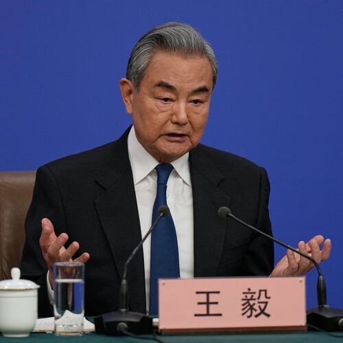 Chinese Foreign Minister Wang Yi speaks during a press conference on the sideline of the National People's Congress (NPC) at the media center, in Beijing, Sunday, March 8, 2026. (AP Photo/Andy Wong)