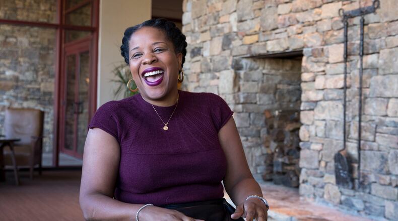 Novelist Tayari Jones talks about her newest novel “An American Marriage” inside the lobby of the Emory University Conference Center Hotel. Jones will join the faculty of Emory University this fall. ALYSSA POINTER/ALYSSA.POINTER@AJC.COM