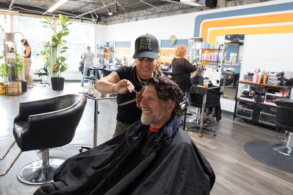 Stylist Bree Mitchell cuts a client's hair at Keenan Salon on Cheshire Bridge Road in Atlanta on Thursday, June 18, 2026. (Ben Gray for the AJC)