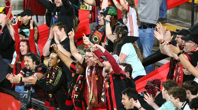 042022 Kennesaw: Atlanta United fans celebrate a 6-0 victory over Chattanooga FC in the Lamar Hunt U.S. Open Cup on Wednesday, April 20, 2022, in Kennesaw. “Curtis Compton / Curtis.Compton@ajc.com”