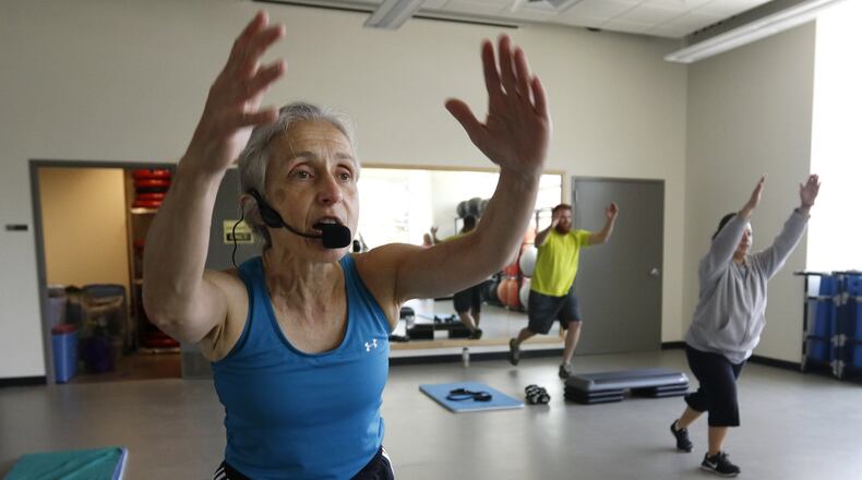 Grace Chalon, group exercise instructor, leads a “tight and toned” class at the fitness and recreation center at TWU in Denton, Texas, on May 11, 2016. (Rose Baca/Dallas Morning News/TNS)
