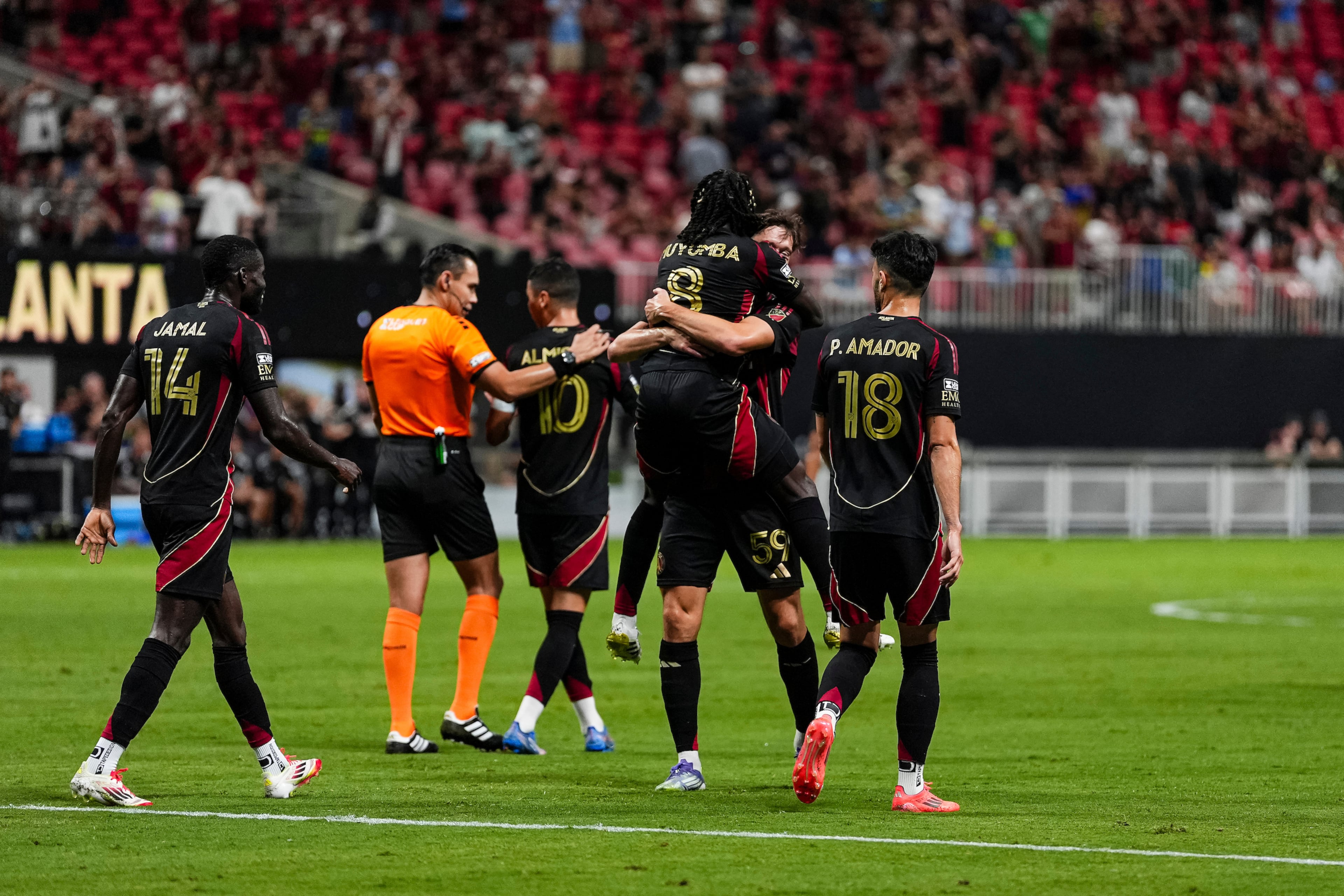 Atlanta United midfielder Alexey Miranchuk celebrates with Atlanta United midfielder Tristan Muyumba after scoring a goal during the Leagues Cup match against Necaxa at Mercedes-Benz Stadium on Wednesday, July 30, 2025. (Matthew Dingle/Atlanta United)