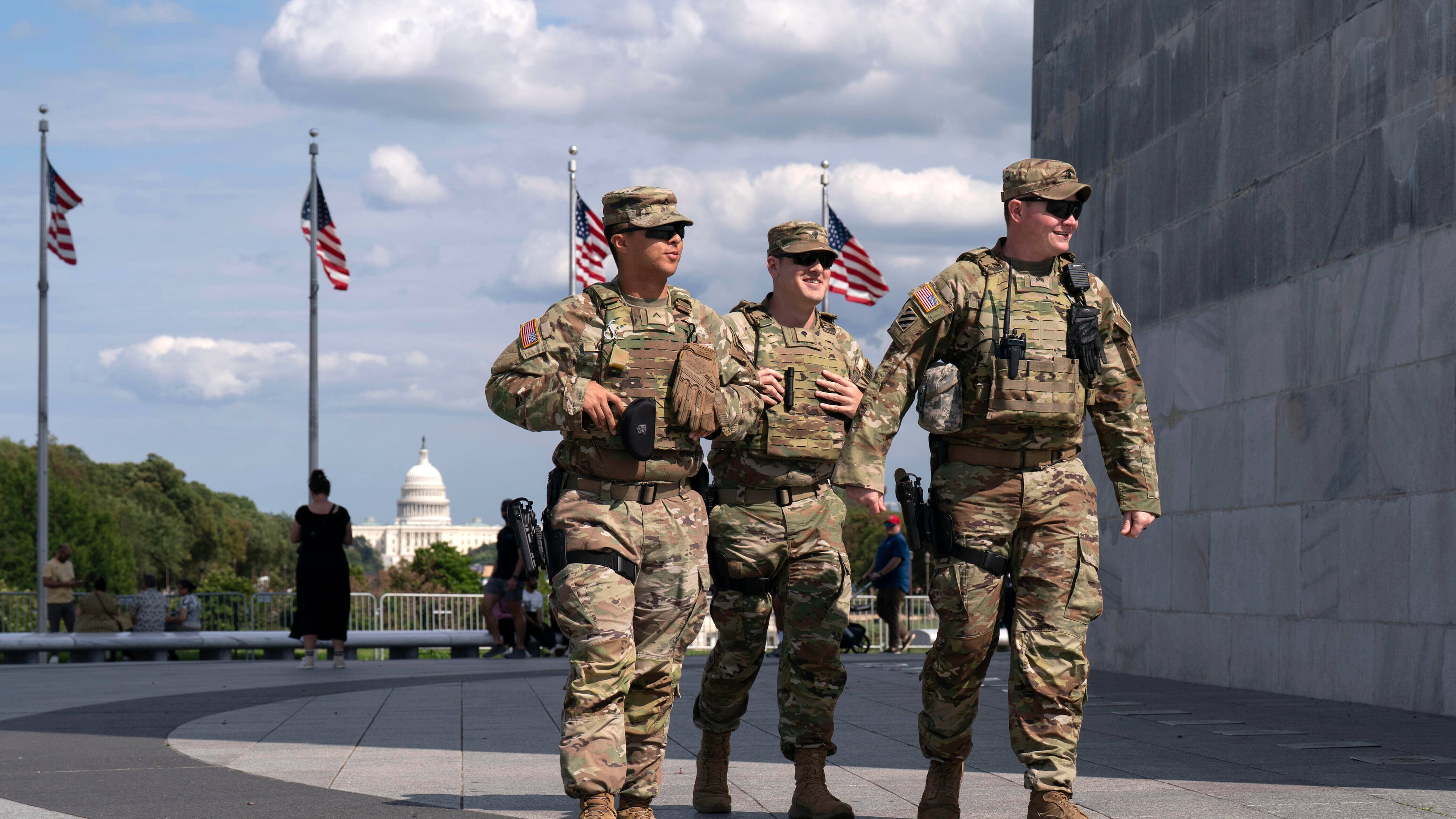 FILE - Members of the Louisiana National Guard patrol the grounds of the Washington Monument at the National Mall, Sept. 7, 2025, in Washington. (AP Photo/Jose Luis Magana, File)