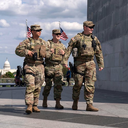 FILE - Members of the Louisiana National Guard patrol the grounds of the Washington Monument at the National Mall, Sept. 7, 2025, in Washington. (AP Photo/Jose Luis Magana, File)