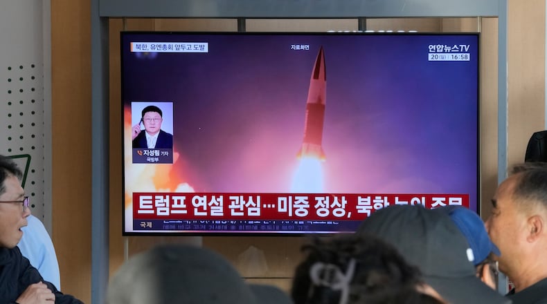 A TV screen shows a file image of a North Korean missile launch during a news program at Seoul Railway Station in Seoul, South Korea, Sunday, Sept. 20, 2026. (AP Photo/Ahn Young-joon)