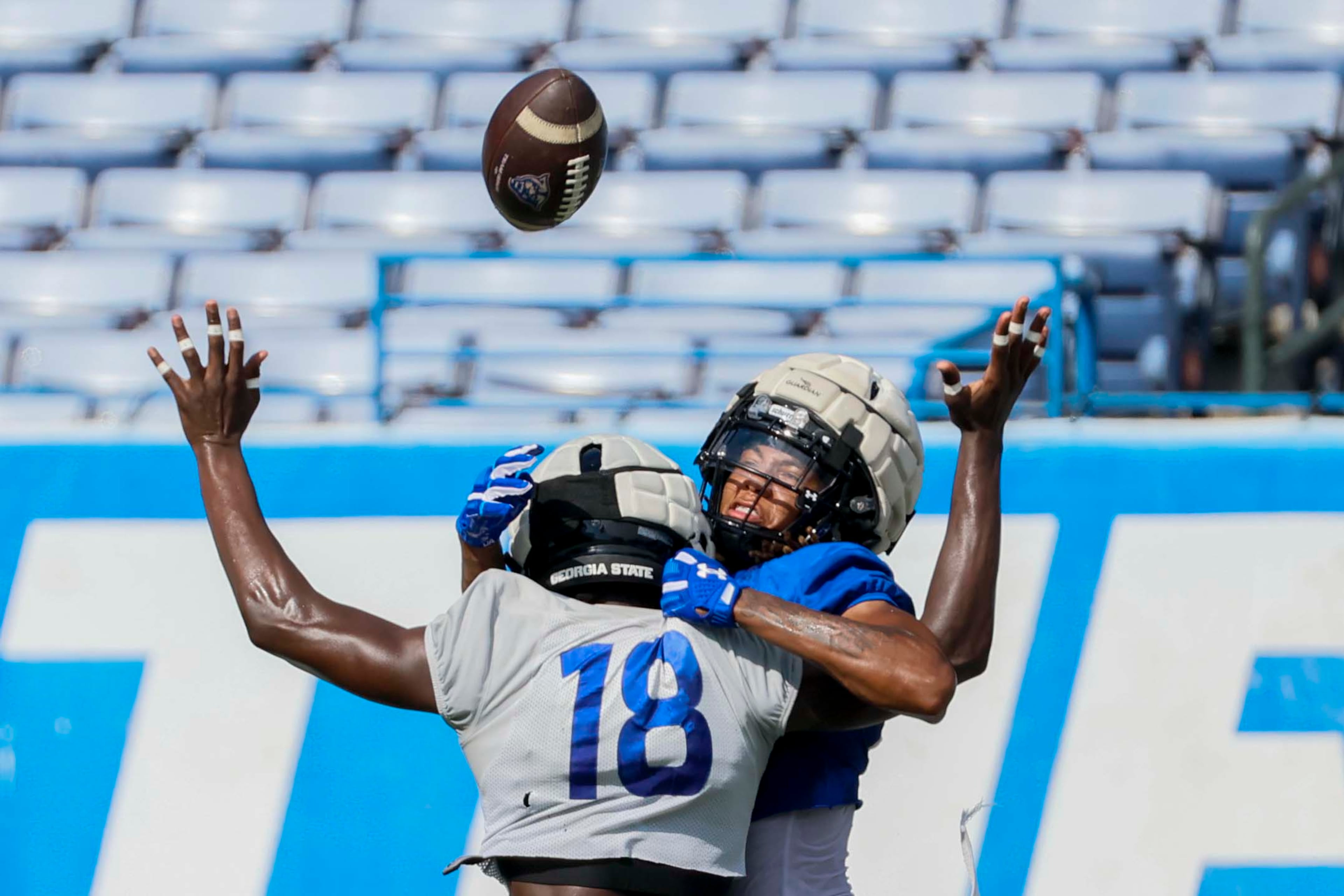 GSU corner back Chams Diagne (18) stops a teammate from catching the ball during Georgia State University’s first day of practice at Center Parc Stadium on Thursday, July 31, 2025, in Atlanta.
(Miguel Martinez/ AJC)