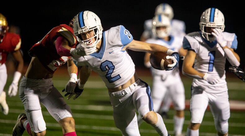 Cambridge's Will Taylor (2) runs the ball during a GHSA high school football game between Cambridge High School and Johns Creek High School in Johns Creek, Ga. on Friday, October 15, 2021. (Photo/Jenn Finch)