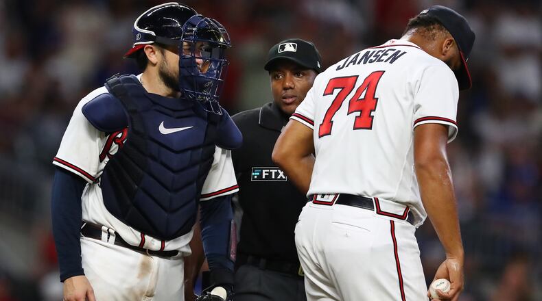 Atlanta Braves catcher Travis d'Arnaud confers with pitcher Kenley Jansen who allowed two runs to the Los Angles Dodgers during the ninth inning in a MLB baseball game to extend the game to extra innings on Sunday, June 26, 2022, in Atlanta. The Dodgers beat the Braves 5-3 in 11 innings. Curtis Compton / Curtis.Compton@ajc.com