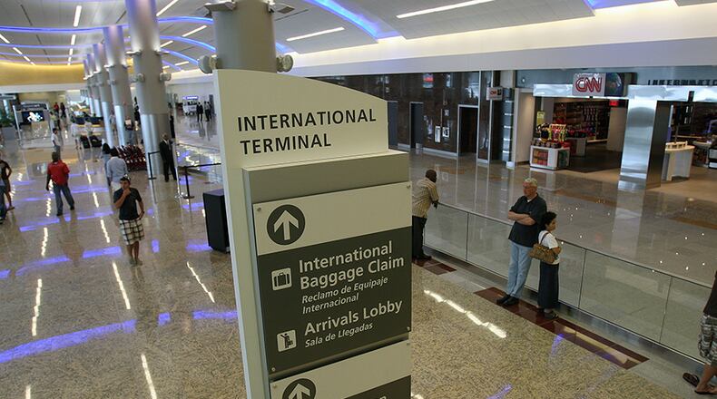 May 16, 2012-Atlanta-The Maynard H. Jackson Jr. International Terminal officially opened its doors today as passengers from around the globe got their first look at the new facility. Construction of the terminal began in the summer of 2008 and the $1.4 billion facility has eight security checkpoint lanes for international departing passengers and five recheck lanes for domestic connecting passengers. VINO WONG / VWONG@AJC.COM