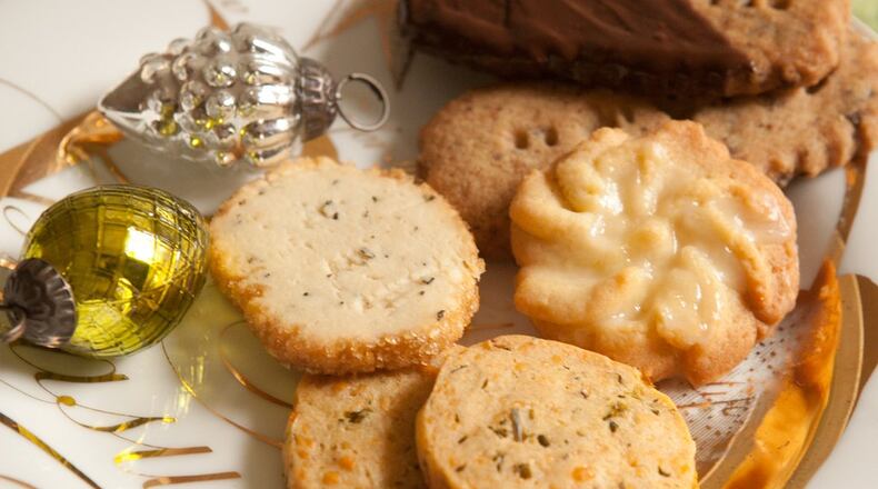 Christmas cookies: Cheddar kale chip, Espresso Shortbread, Lemon spritz, and Rosemary crisp (styling by Lisa Rochon ) (Photography by Renee Brock/Special)