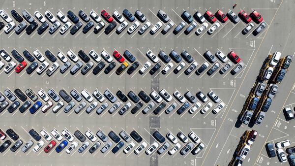 Cars line the BNSF Railway vehicle storage facility at the Port of Richmond on Thursday, April 3, 2025, in Richmond, Calif. (AP Photo/Noah Berger)