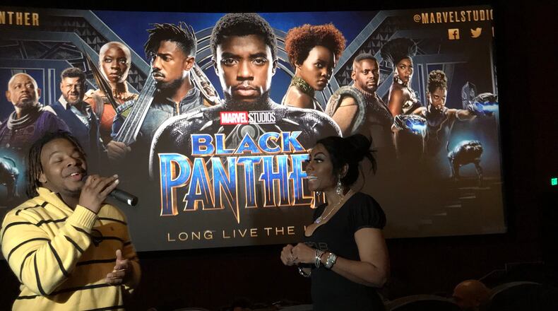 Sasha the Diva (right), the afternoon jock at Kiss 104.1, had some contestants sing for prizes before a "Black Panther" screening Tuesday night, February 13, 2018. CREDIT: Rodney Ho/rho@ajc.com