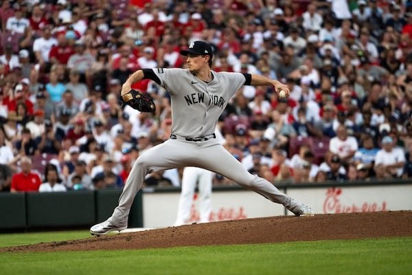 New York Yankees pitcher Max Fried throws a pitch in the third inning of a baseball game against the Cincinnati Reds, Wednesday, June 25, 2025, in Cincinnati. (AP Photo/Michael Swensen)