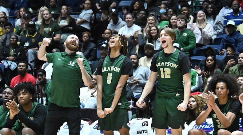 Grayson players and coaching staff react during the second half of GHSA Basketball Class 7A Boy’s State Championship game at the Macon Centreplex, Saturday, Mar. 9, 2024, in Macon. Grayson won 51-41 over McEachern. (Hyosub Shin / Hyosub.Shin@ajc.com)