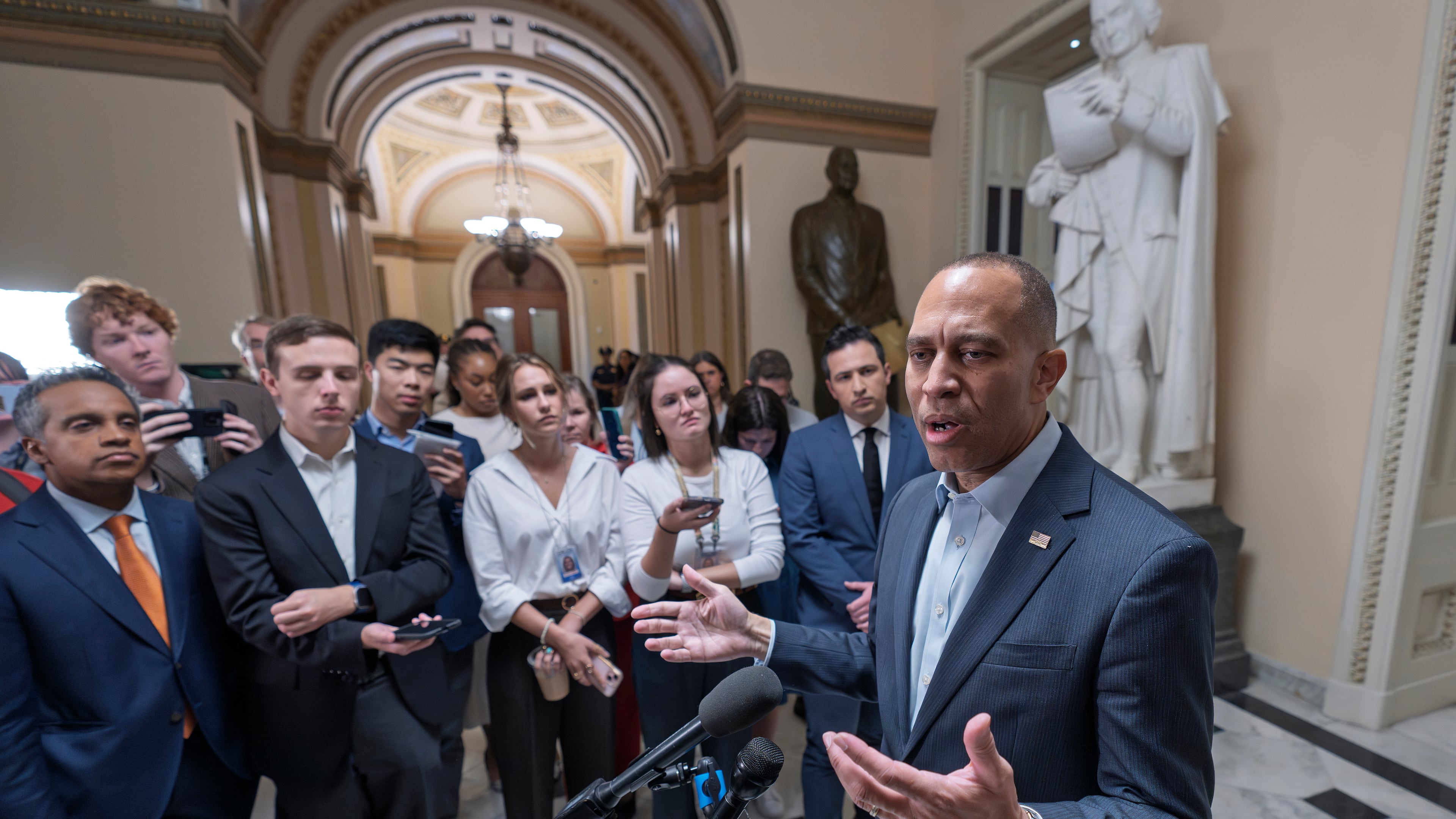 House Minority Leader Hakeem Jeffries, D-N.Y., speaks with reporters before he and the top congressional leaders go to the White House to meet with President Donald Trump on the looming government funding crisis, at the Capitol in Washington, Monday, Sept. 29, 2025. (AP Photo/J. Scott Applewhite)