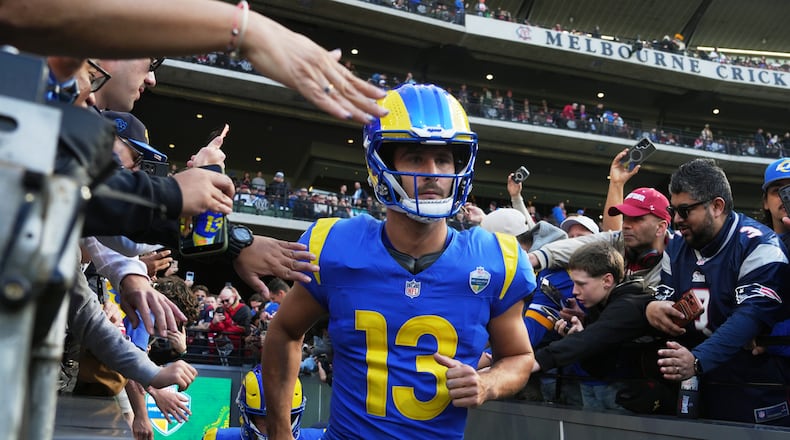 Los Angeles quarterback Stetson Bennett takes the field in the fourth quarter in the Rams' game against the San Francisco 49ers in Australia. (Asanka Brendon Ratnayake/AP)