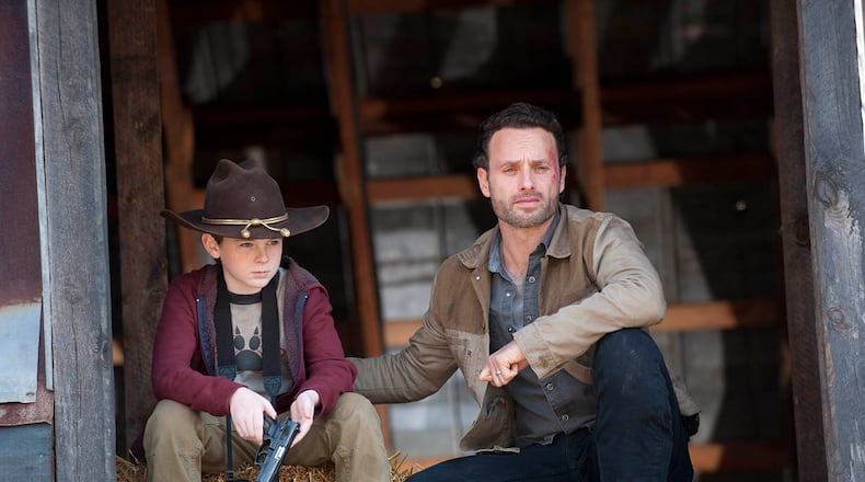 Georgia native Chandler Riggs was cast in "The Walking Dead" at age 10, but he'd been acting for three years by then. Chandler plays Carl Grimes, son of Rick Grimes, played by Andrew Lincoln. GENE PAGE / AMC