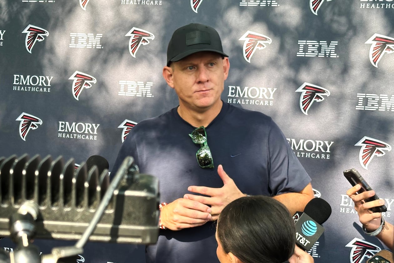 At age 41, Falcons kicker Nick Folk — pictured speaking with reporters before the team's first training camp in July — comes to Atlanta having made 78 of 81 field goals and 75 of 77 point-after attempts over the last three seasons. (Charles Odum/AP)