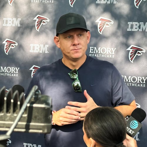 At age 41, Falcons kicker Nick Folk — pictured speaking with reporters before the team's first training camp in July — comes to Atlanta having made 78 of 81 field goals and 75 of 77 point-after attempts over the last three seasons. (Charles Odum/AP)