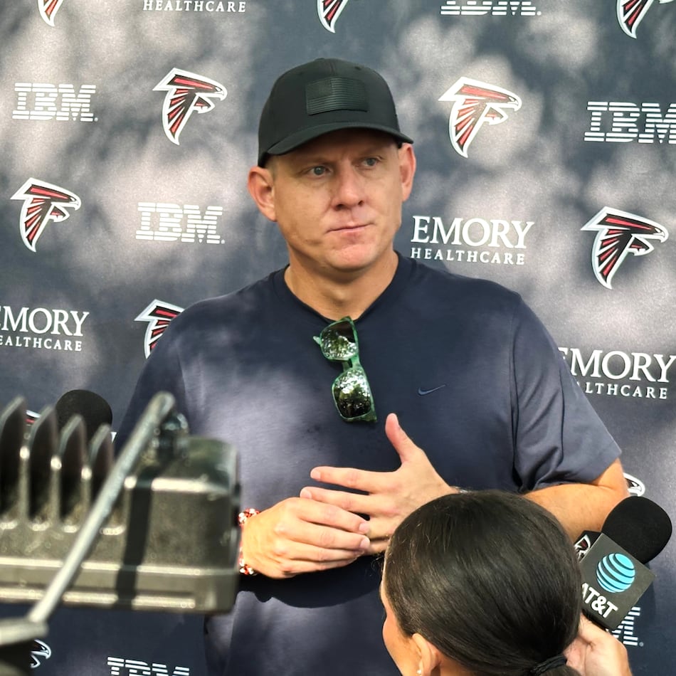 At age 41, Falcons kicker Nick Folk — pictured speaking with reporters before the team's first training camp in July — comes to Atlanta having made 78 of 81 field goals and 75 of 77 point-after attempts over the last three seasons. (Charles Odum/AP)