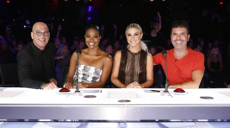 This image released by NBC shows celebrity judges (from left) Howie Mandel, Gabrielle Union, Julianne Hough and Simon Cowell on the set of “America’s Got Talent” in Los Angeles. Union recently thanked supporters for defending her amid reports she was fired from “America’s Got Talent” after complaining about racism and other issues. TRAE PATTON / NBC VIA AP