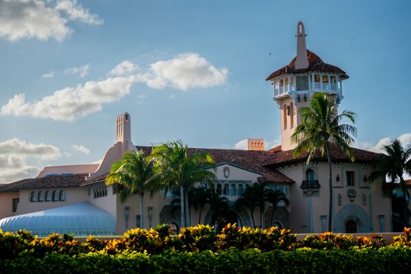 
                        Former President Donald Trump's Mar-a-Lago Club on the evening he was indicted in Manhattan, in Palm Beach, Fla., March 30, 2023. Donald J. Trump was indicted in Manhattan on Thursday for his role in paying hush money to a porn star, according to five people with knowledge of the matter. (Josh Ritchie/The New York Times)
                      