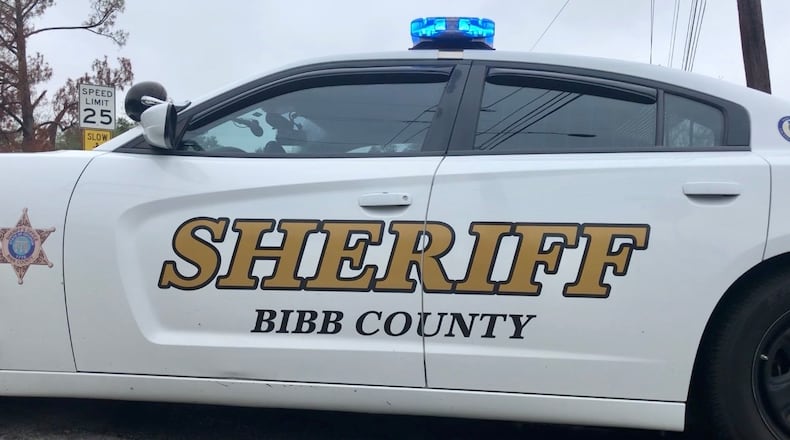 The deputies, two men and a woman, have been charged with stalking, prohibited use of a traffic control device and violation of their oaths of office. All three have resigned. (Courtesy of Joe Kovac Jr./AJC)