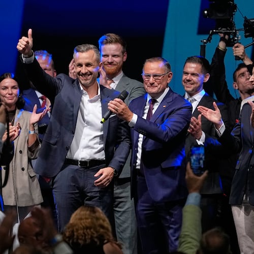 Top candidate Ulrich Siegmund shows thumbs up beside party leaders Tino Chrupalla and Alice Weidel, from left, at an election party of the "Alternative for Germany" (AfD) after the Saxony-Anhalt state elections in Magdeburg, eastern Germany, Sunday, Sept. 6, 2026. (AP Photo/Matthias Schrader)