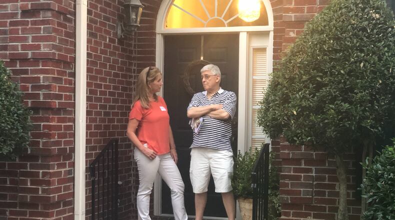 Lynne Homrich, a Republican running in the 7th Congressional District, talks to Bill Schilleci at his home in Forsyth County. Homrich, like other Republicans running in the district, has positioned herself as a supporter of President Donald Trump and an opponent to efforts to impeach him. That was something Schilleci wanted to hear. “It’s chaos,” he said. “This impeachment thing started before Donald Trump put his hand on the Bible.” Impeachment is also an issue Democrats are running on in Georgia to varying degrees.