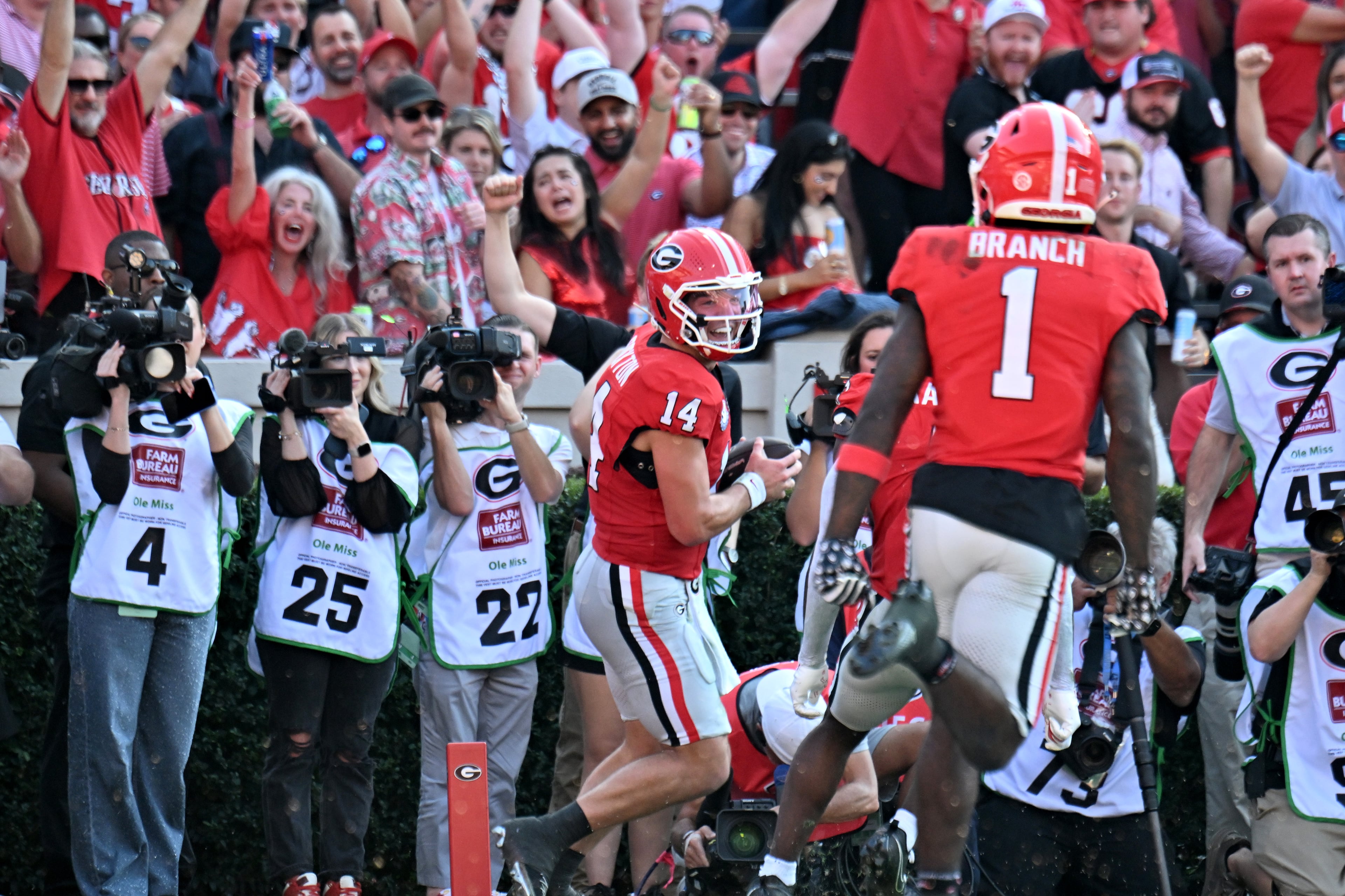 Georgia quarterback Gunner Stockton (14) celebrates after scoring a touchdown catch during the first half in an NCAA football game at Sanford Stadium, Saturday, October 18, 2025, in Athens. (Hyosub Shin / AJC)