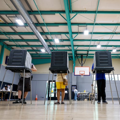 FILE - Voters cast their ballots during the primary election in Windsor, Conn., Aug. 11, 2026. (AP Photo/Rusty Jones, File)