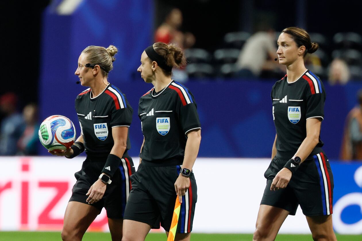 Head referee Tori Penso (left) is the first U.S. woman to be head ref at a World Cup match. She is joined by assistant referee Brooke Mayo (center) and Kathryn Nesbitt before the start of the Czechia vs. South Africa Group A FIFA World Cup match at Atlanta Stadium (Mercedes-Benz Stadium) on Thursday, June 18, 2026. (Miguel Martinez/AJC)