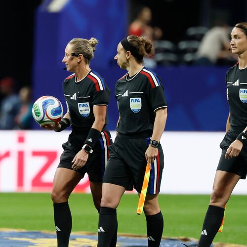 Head referee Tori Penso (left) is the first U.S. woman to be head ref at a World Cup match. She is joined by assistant referee Brooke Mayo (center) and Kathryn Nesbitt before the start of the Czechia vs. South Africa Group A FIFA World Cup match at Atlanta Stadium (Mercedes-Benz Stadium) on Thursday, June 18, 2026. (Miguel Martinez/AJC)