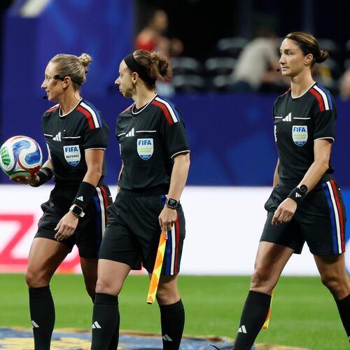 Head referee Tori Penso (left) is the first U.S. woman to be head ref at a World Cup match. She is joined by assistant referee Brooke Mayo (center) and Kathryn Nesbitt before the start of the Czechia vs. South Africa Group A FIFA World Cup match at Atlanta Stadium (Mercedes-Benz Stadium) on Thursday, June 18, 2026. (Miguel Martinez/AJC)