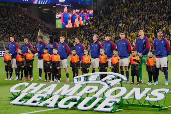 Barcelona players ahead of the Champions League quarterfinals second leg soccer match between Borussia Dortmund and Barcelona, at the Signa-Iduna Park in Dortmund, Germany, Tuesday, April 15, 2025. (AP Photo/Martin Meissner)