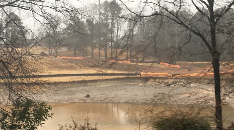 One of the former irrigation ponds on the former site of Lanier Golf Course, on which developer Danny Bennett is hoping to build more than 300 homes. SPECIAL PHOTO / JULIE ALLEN