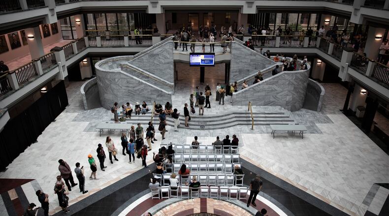 Opponents of the planned public safety training center in DeKalb County descend on Atlanta City Hall during the May 15 full council meeting to sign up for public comment.
