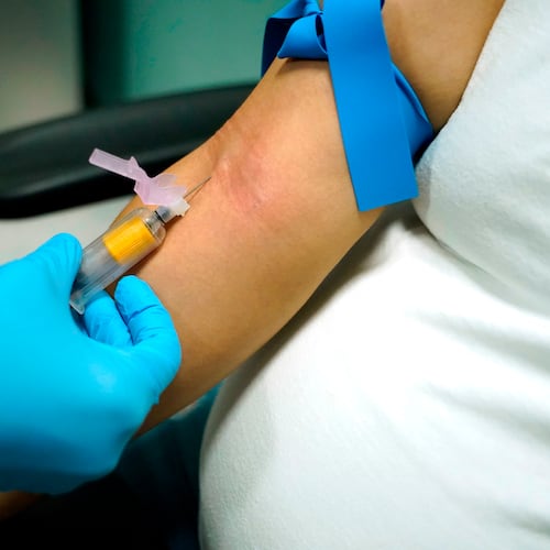 FILE - A technician draws blood at a women's clinic in Jackson, Miss., on Dec. 17, 2021. (AP Photo/Rogelio V. Solis, File)