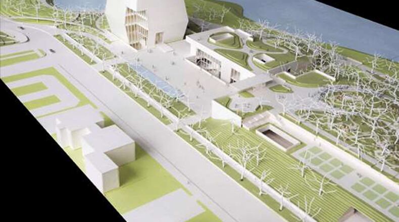 A model showing a view of the Obama Presidential Center looking north shows the Museum, Forum and Library. The Museum, the tallest structure on site, will serve as serve as a lantern for the Obama Presidential Center. The Library and Forum are single story structures with planted terraces.